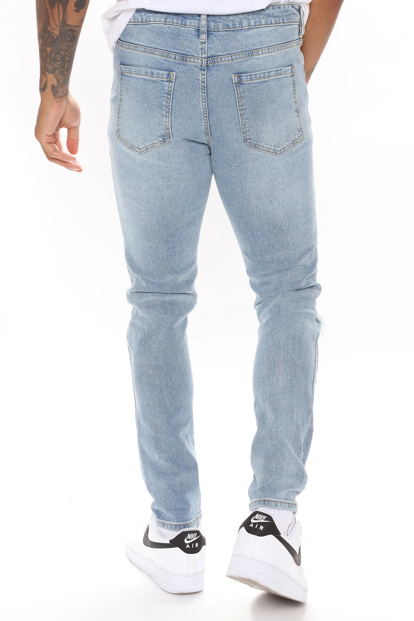 Baroque Patched Ripped Skinny Jeans - Medium Wash