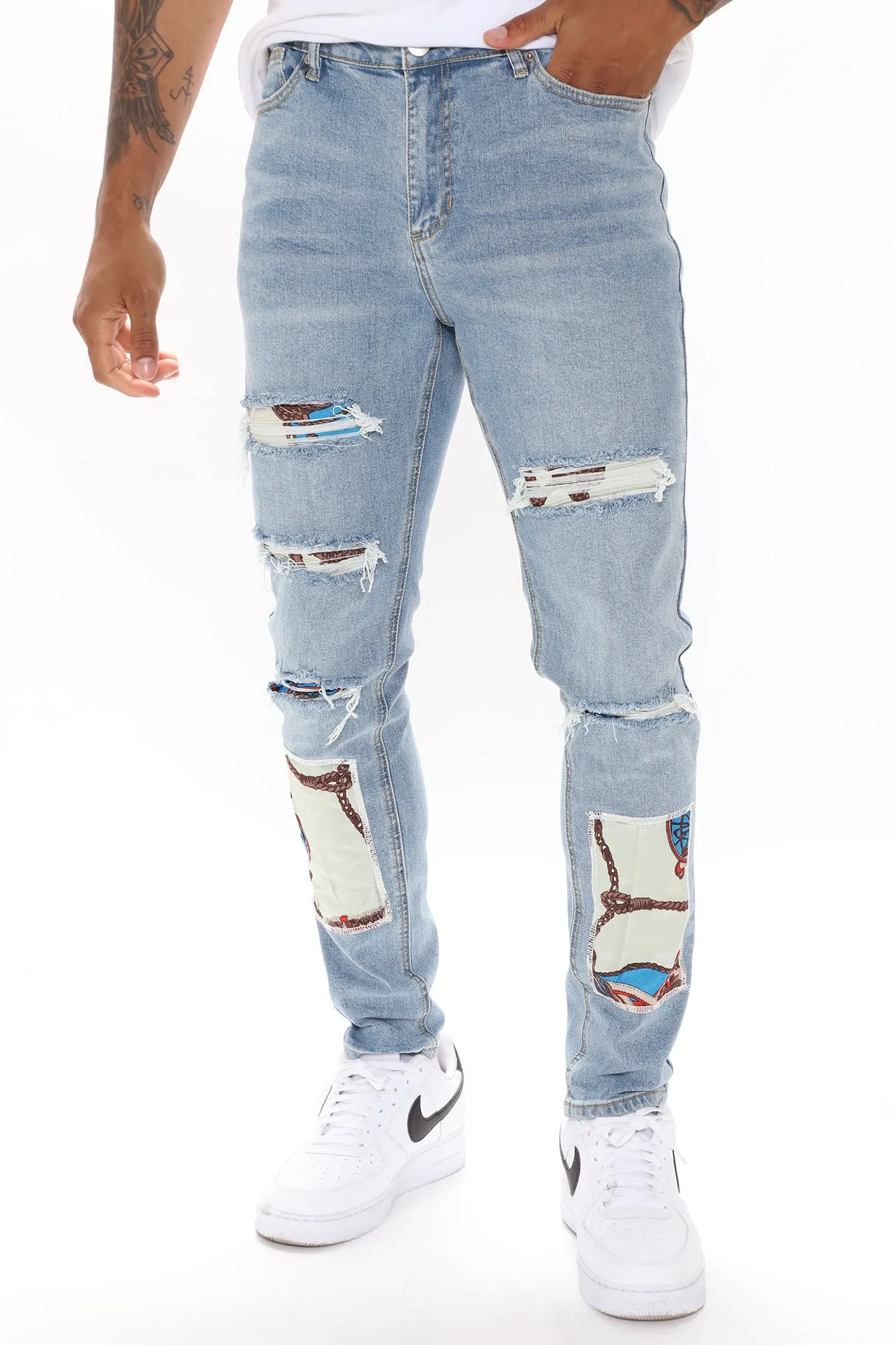 Baroque Patched Ripped Skinny Jeans - Medium Wash