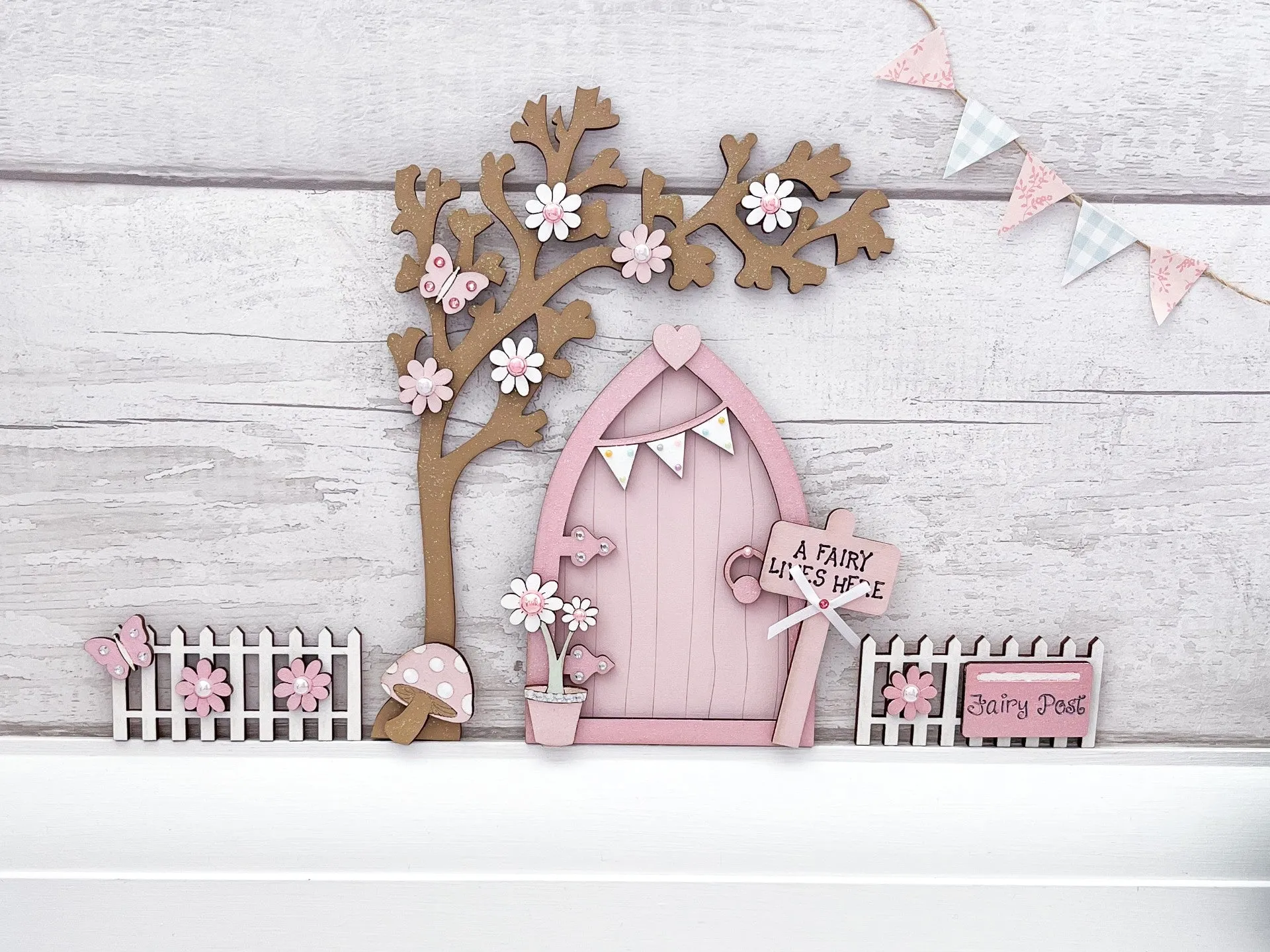 Light Pink Bunting Fairy Door with Fencing and Blossom Tree