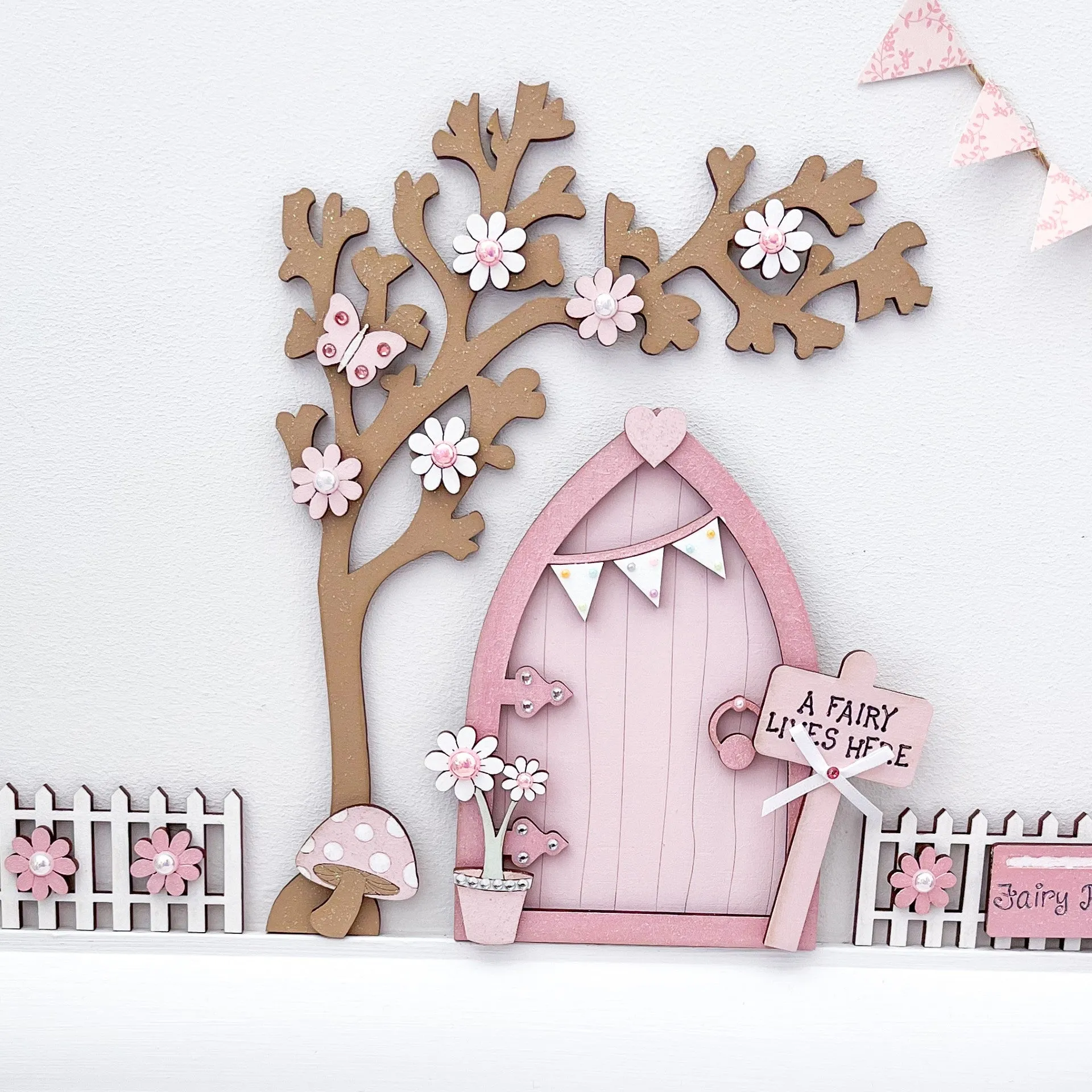 Light Pink Bunting Fairy Door with Fencing and Blossom Tree