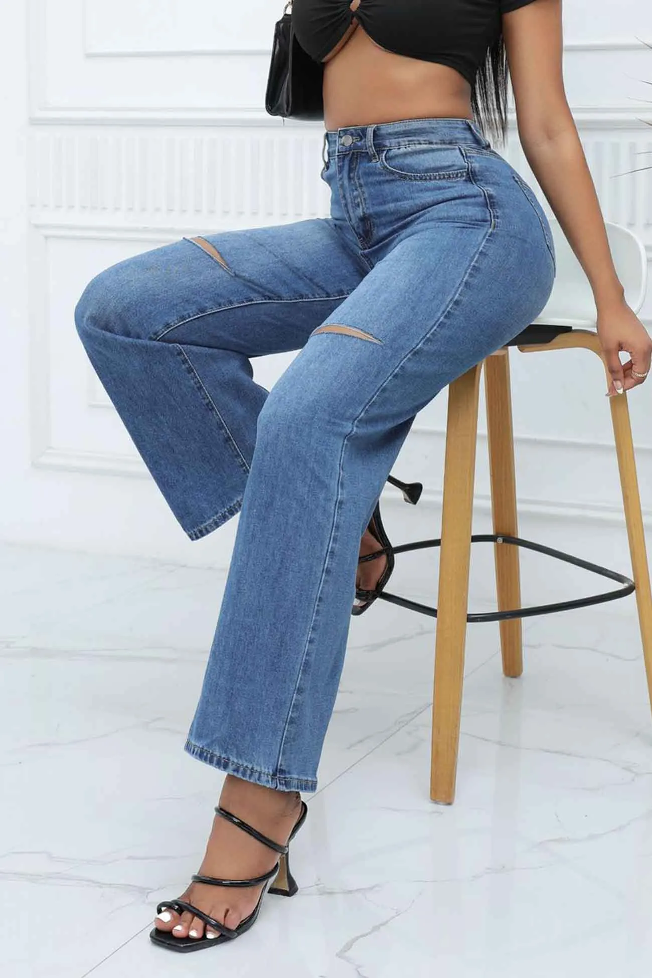 Ripped Mid Rise Flared Jeans